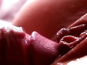 slow motion. extremely close-up. sperm dripping down the pussy